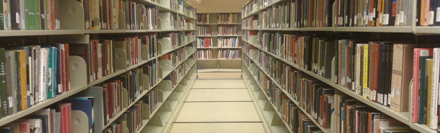 Stacks of books in library