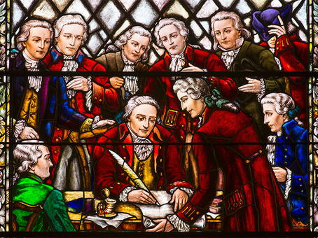 Stained-glass window in Kirkpatrick Chapel depicting William Franklin, Royal Governor of New Jersey, signing the Queen's College charter in 1766.