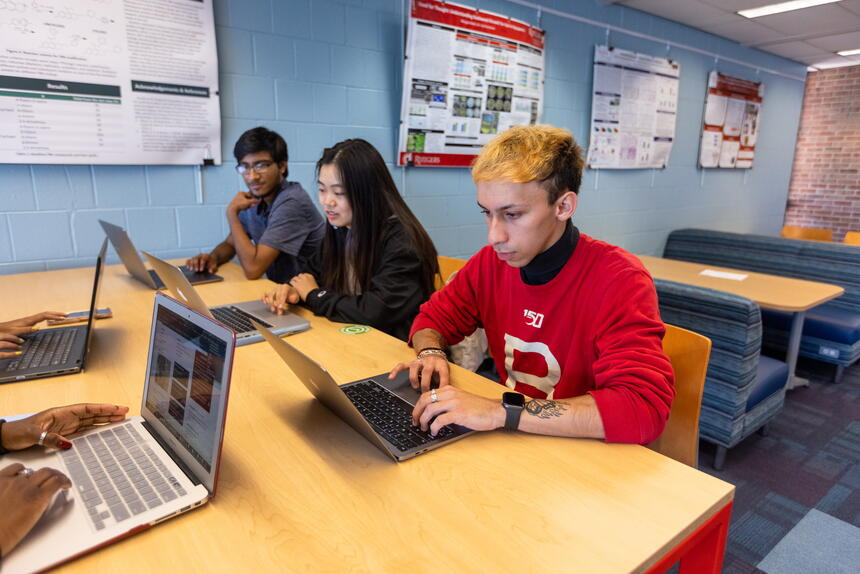 Students studying in the library of science and medicine