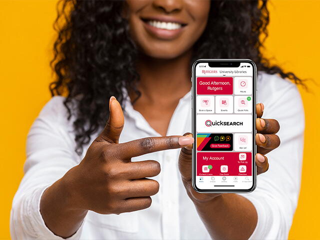 A student showcases the Rutgers Library Mobile app on her smartphone.