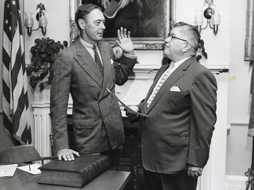 Alexander (left) takes oath as a member of the Board of Governors in 1956.