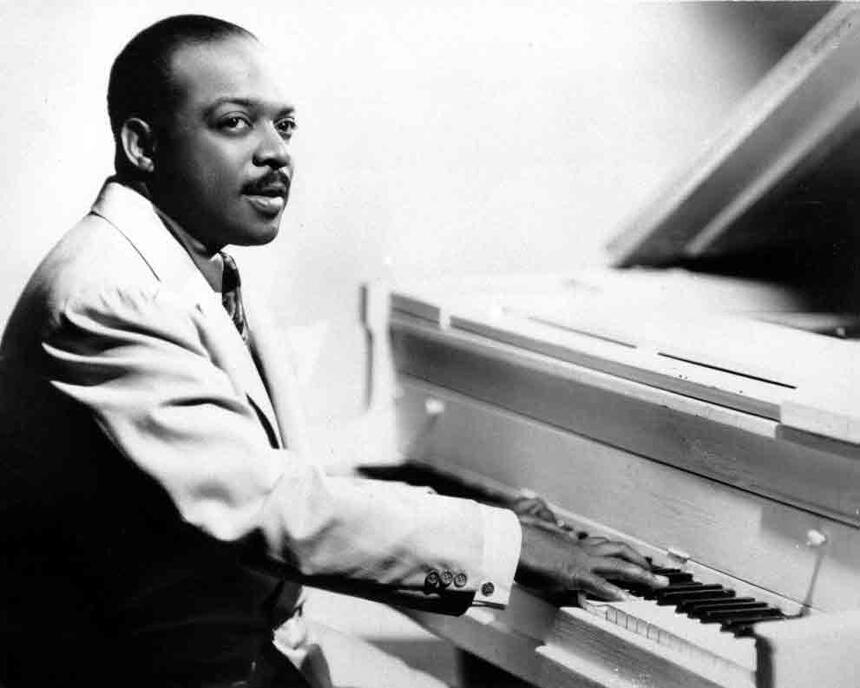 Count Basie at the piano.