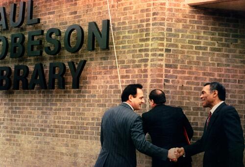 Paul Robeson, Jr. (right) at the unveiling of the new sign for Paul Robeson Library in 1991.