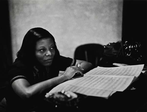 Mary Lou Williams looking at a music score