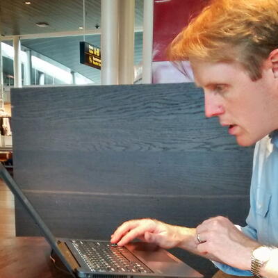 Photo of Chad, working on a laptop