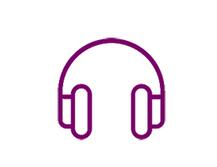 An icon of a line drawing of purple over ear headphones on a white background