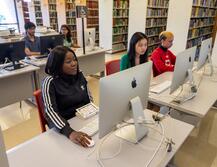 Students using Mac desktops in the Library of Science and Medicine
