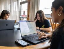 close up on students studying Douglass